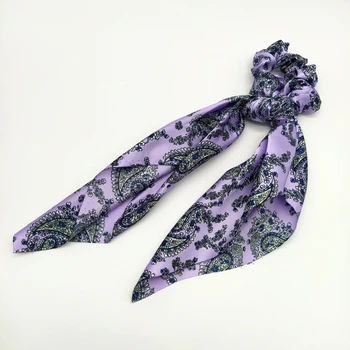 Elastične trake sa po cijeloj površini i ženstveno kravata za kosu.